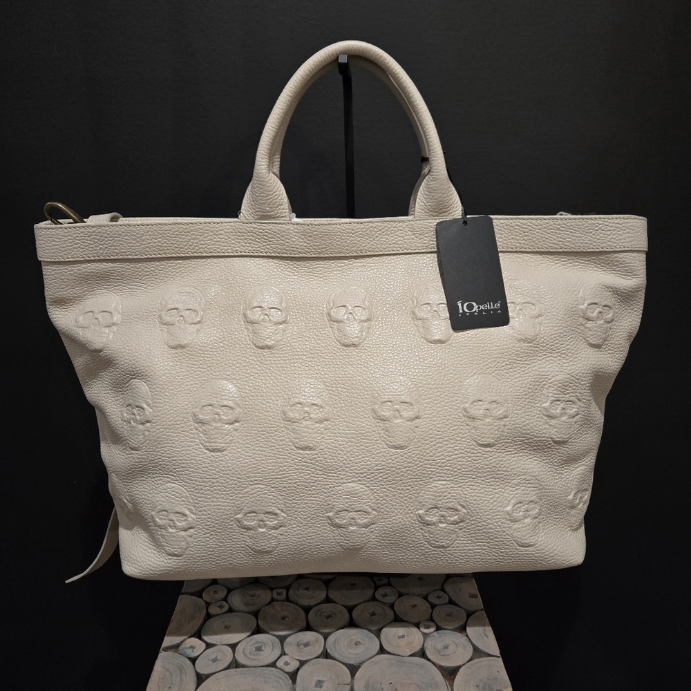 IO Pelle Leather cream colored embossed (skeleton) skulls tote NWT